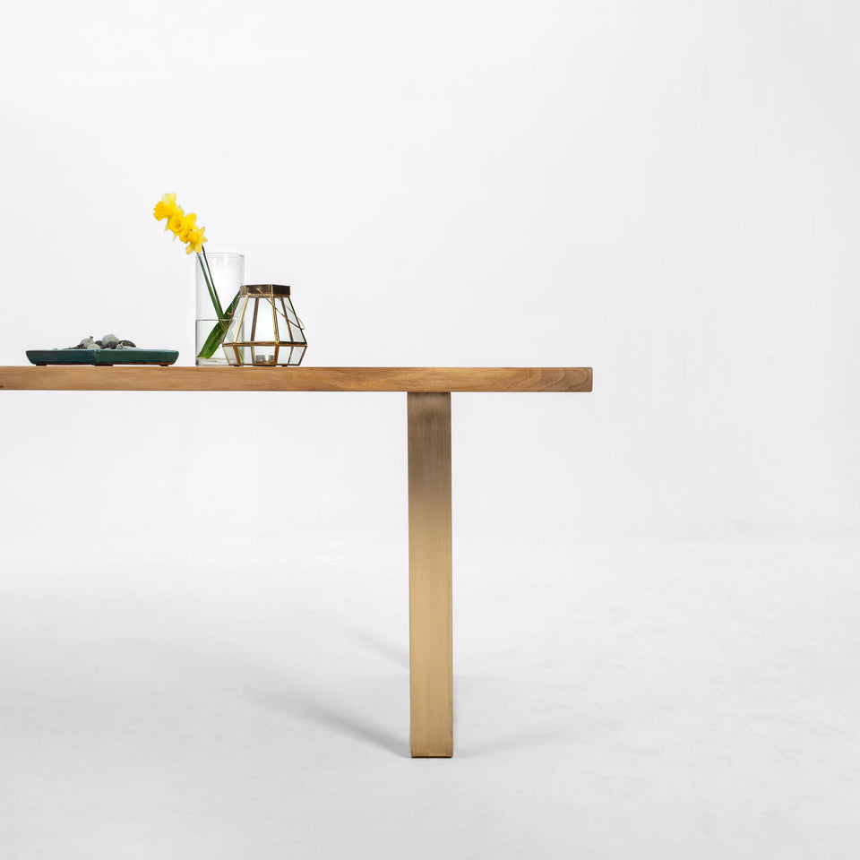 Steel U-legs in black or brass for a modern industrial contrast.