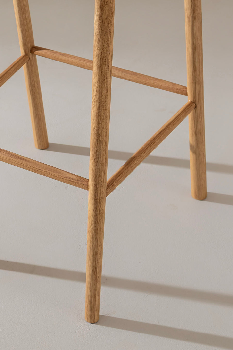 Tapered legs, footrest, and side rails offer support and alternative resting positions