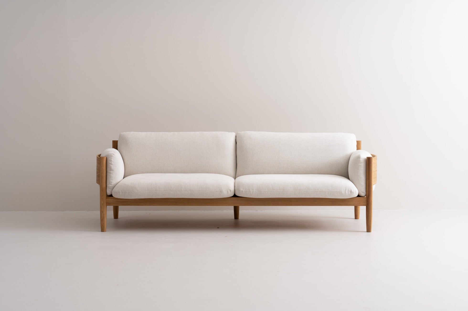 Curved solid wood frame, handcrafted for strength.