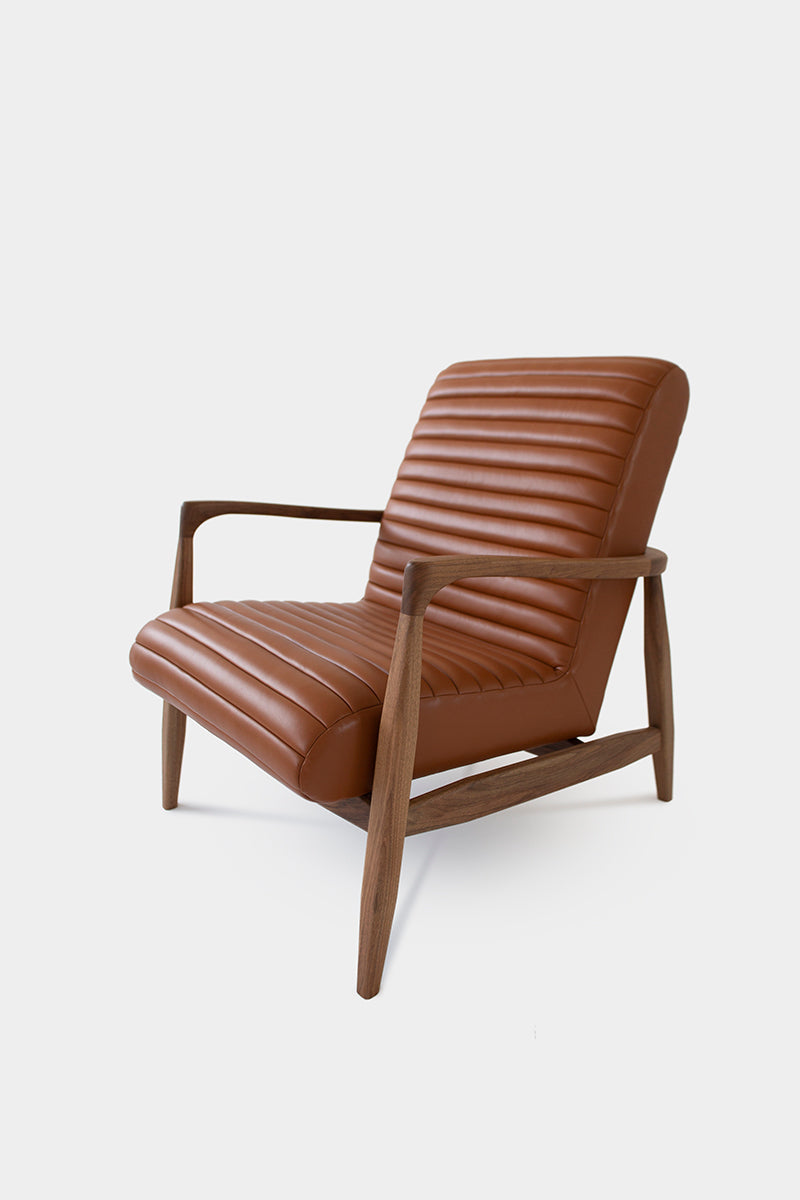 LAICA | Modern Armchair and Ottoman in Spanish Leather or Wool